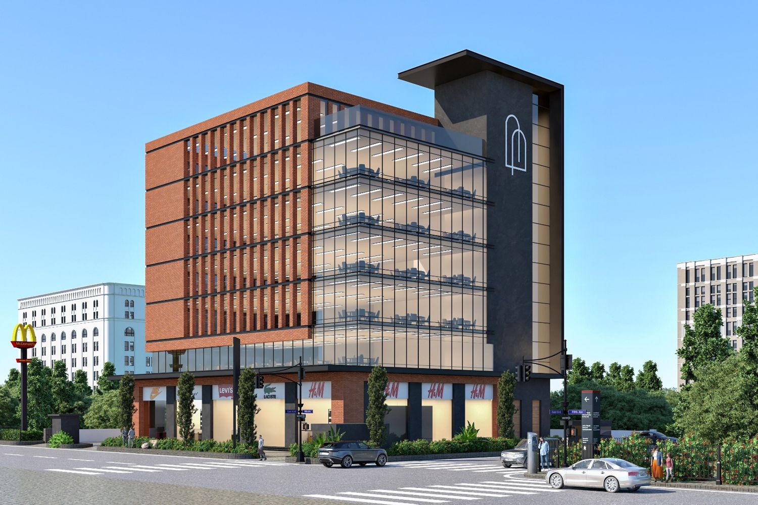 Singh Square office building on Airport Road, Mohali: a brick facade with vertical fins, a glazed corner showing five office floors, a charcoal lift tower, and retail frontage at street level.